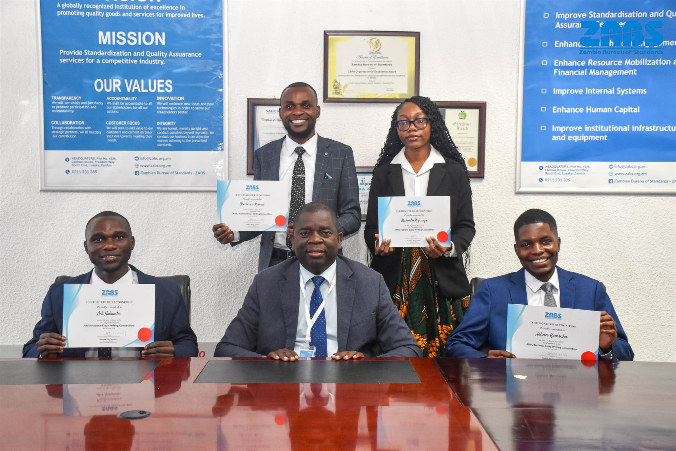 Winners and officials during the ZABS essay competition awards presentation.